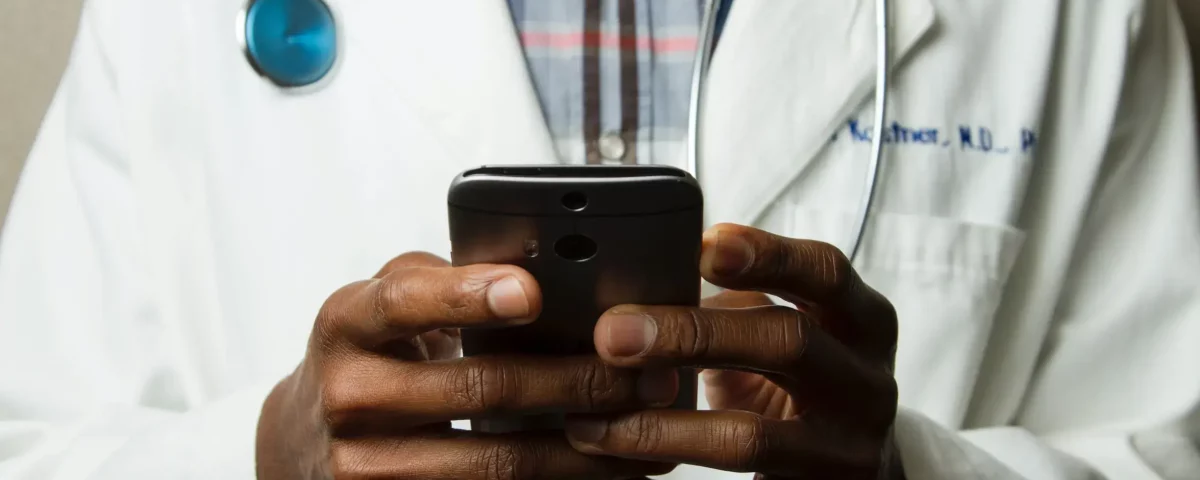 Doctor using cell phone